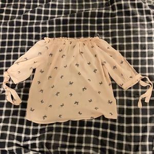 pink off shoulder shirt